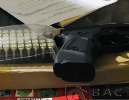 Khẩu súng Vũ Ngọc Dương sử dụng để bắn Lý Văn Sự và số đạn cơ quan điều tra thu giữ
